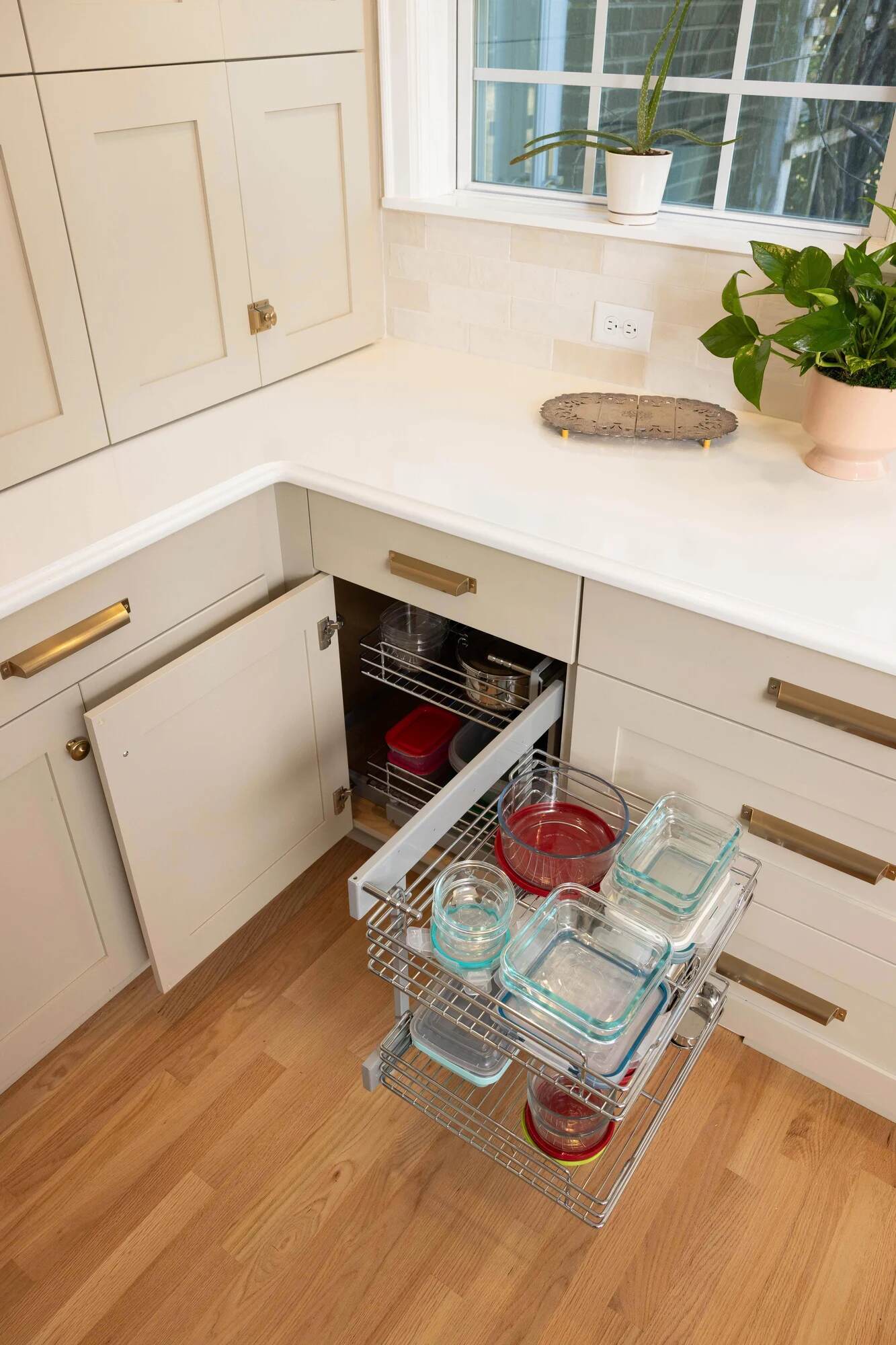Balding Design Build custom home kitchen with pull-out cabinet organizers in Wilmington, NC