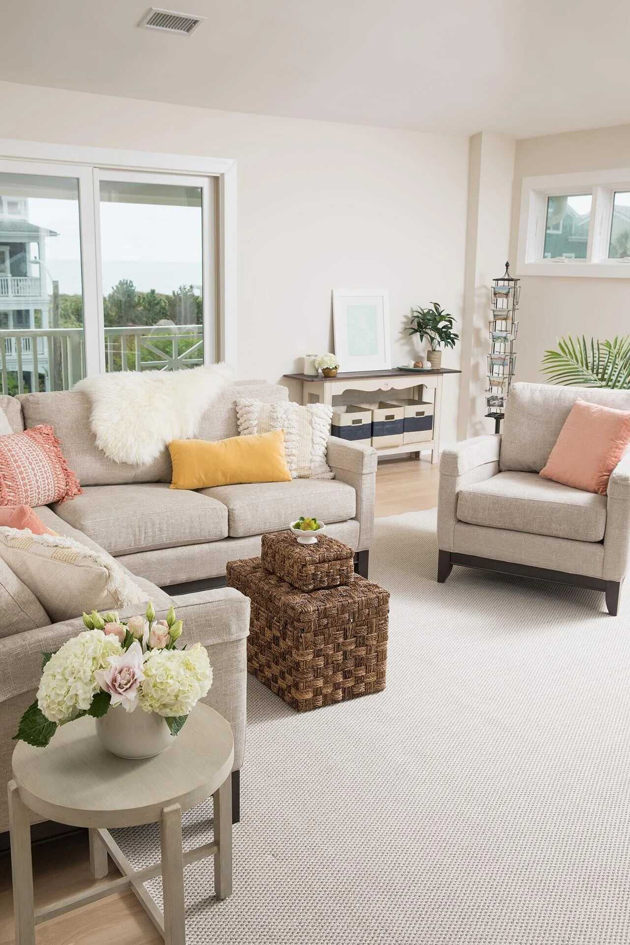Bright and inviting living room with neutral-toned furniture in a Balding Design Build custom home in Wilmington, NC
