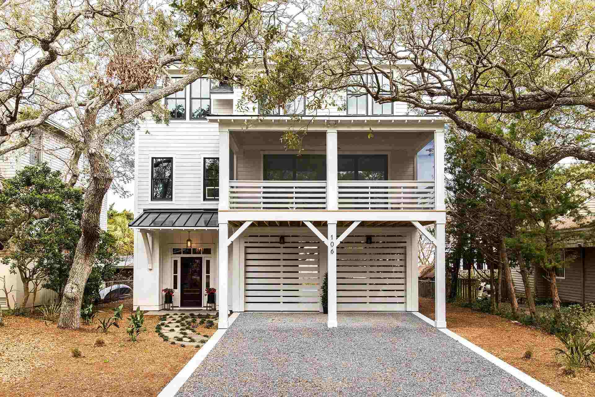 Elegant custom home exterior with contemporary architecture by Balding Design Build in the Middle Sound Loop Area, NC