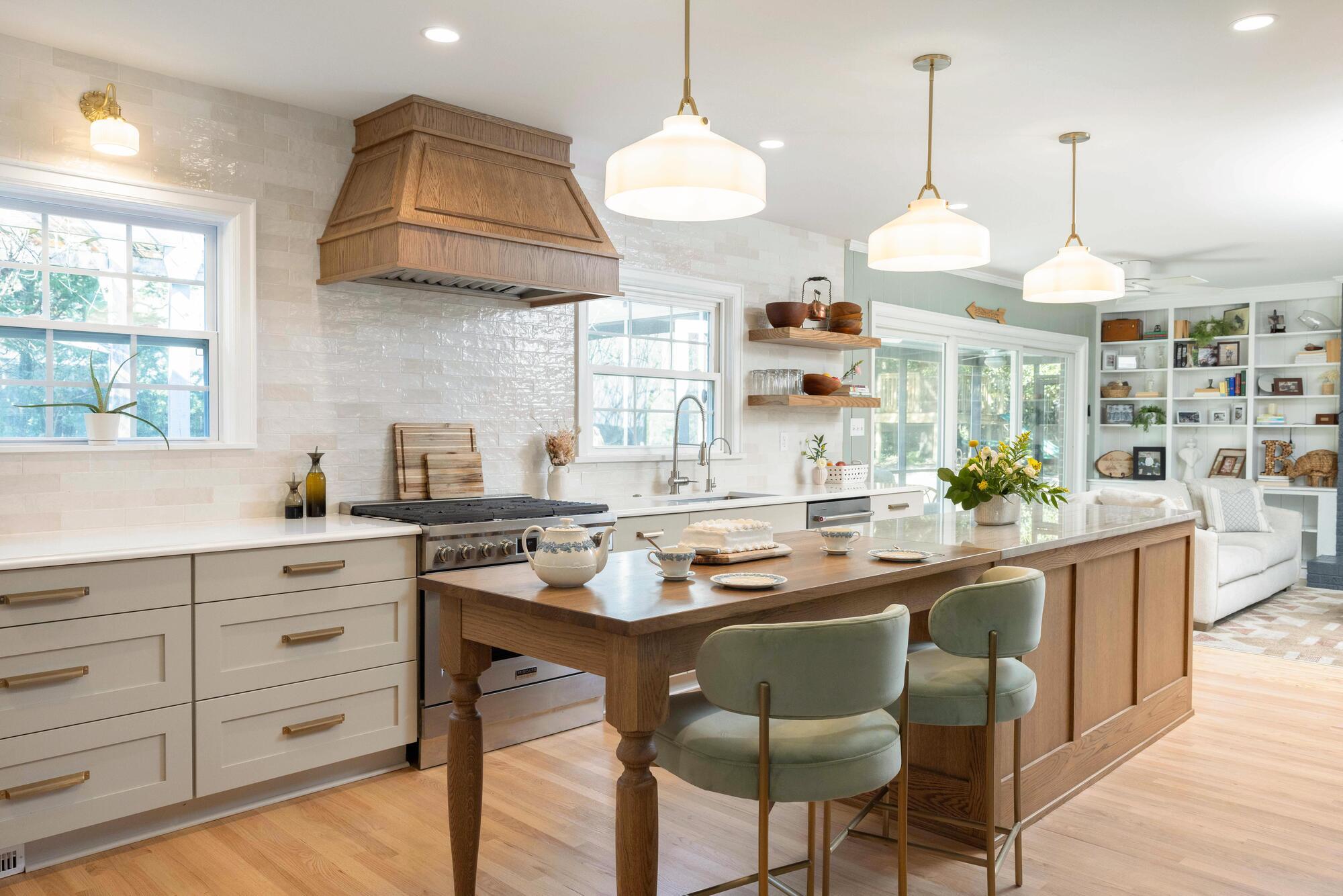 Luxury kitchen remodel featuring a wood range hood and quartz countertops in a Forest Hills, NC home by Balding Design Build