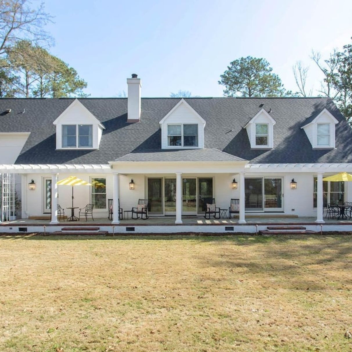 A two-story single-family home in Wilmington, NC with a deck and pool